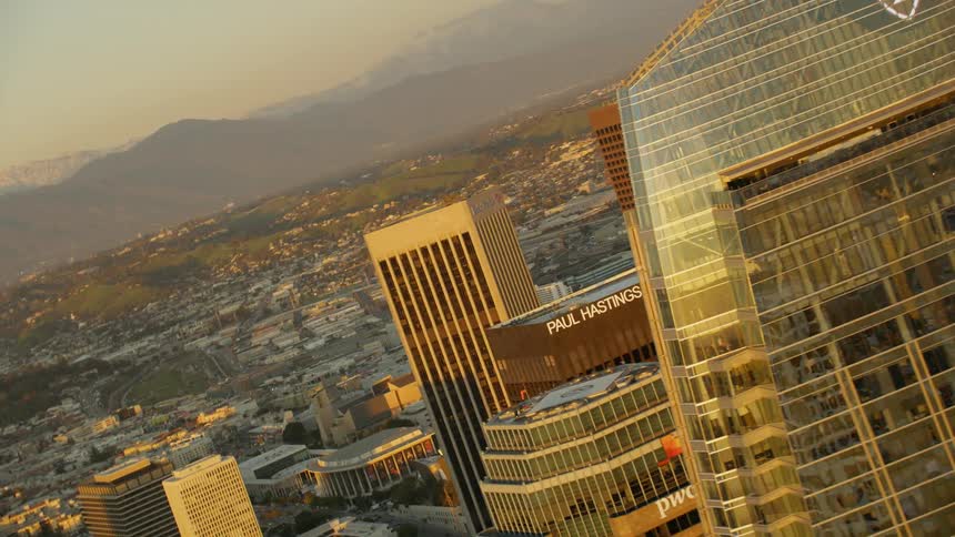 Tall city buildings tower into the sky