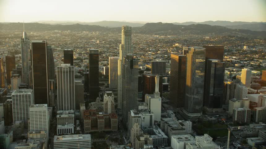 Flying Approach of Downtown Los Angeles at Sunset