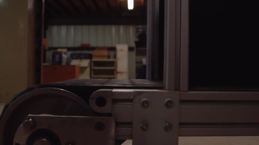 A limb is moving on a conveyor belt from a box
