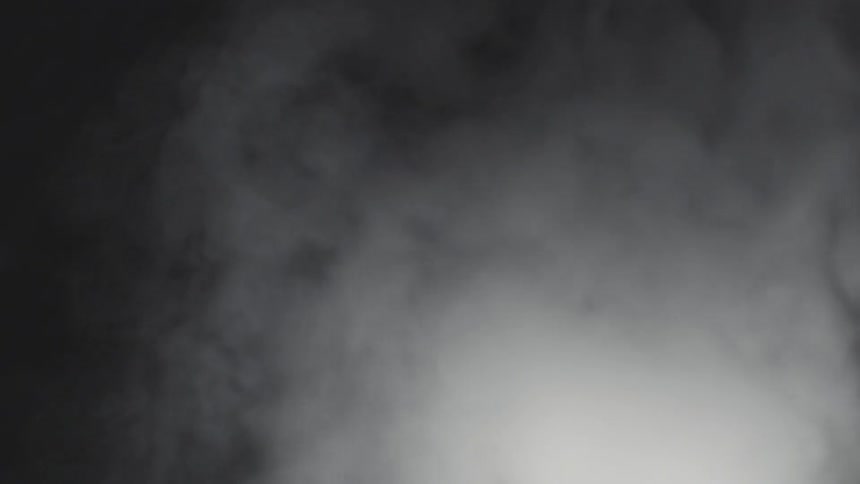 A puff of smoke billows