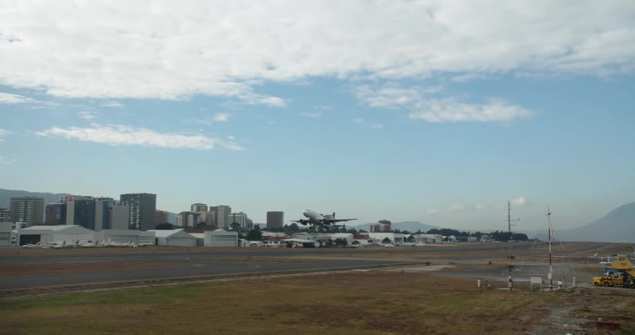 An airplane takes off on a sunny day