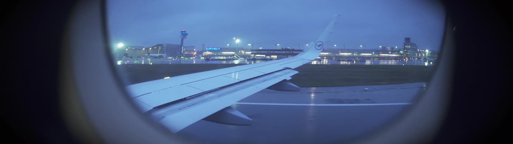 Airplane takes off from a city at night