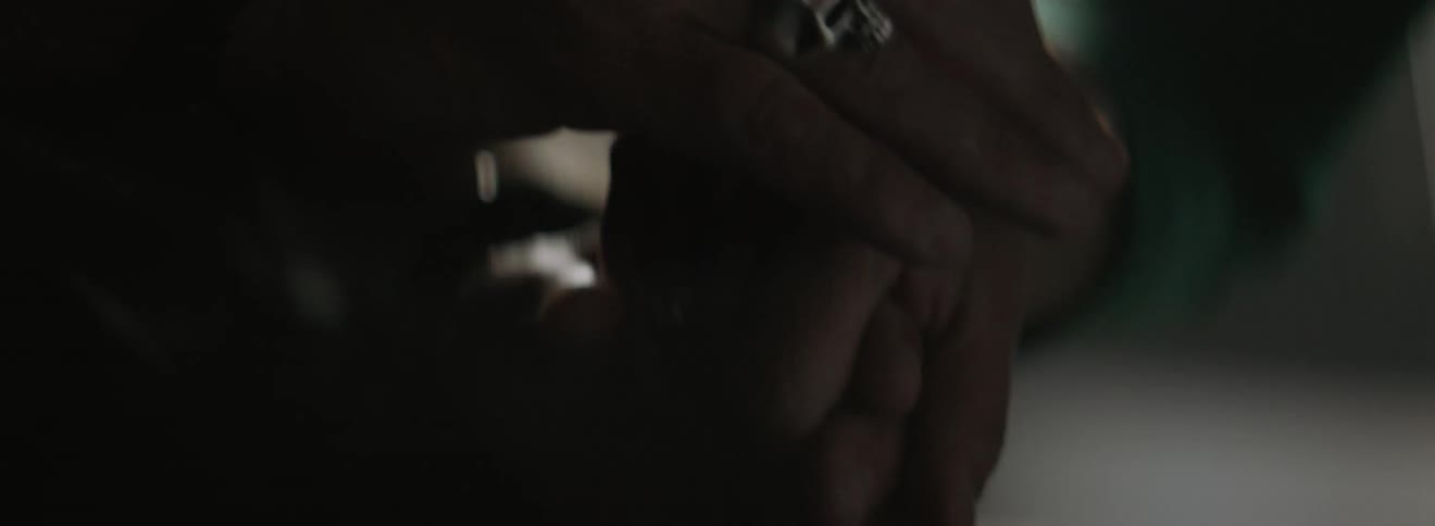 A man and woman hold hands