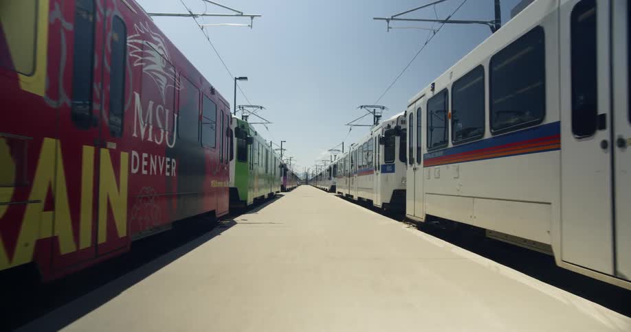 Several trains paused at a train station