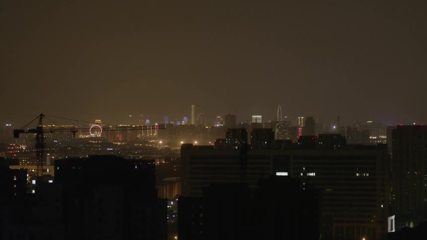 The city si full of brightly lit buildings