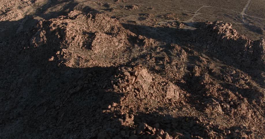 The hills are covered with large rocks