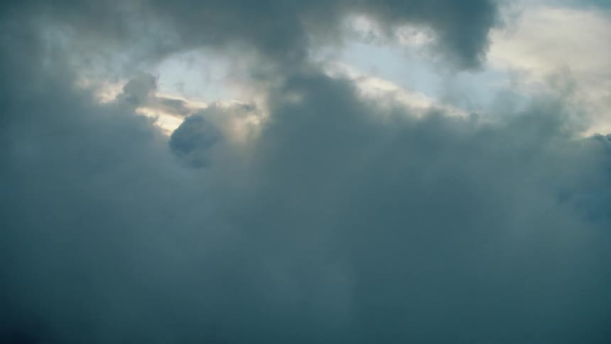 The heavy clouds move across the sky