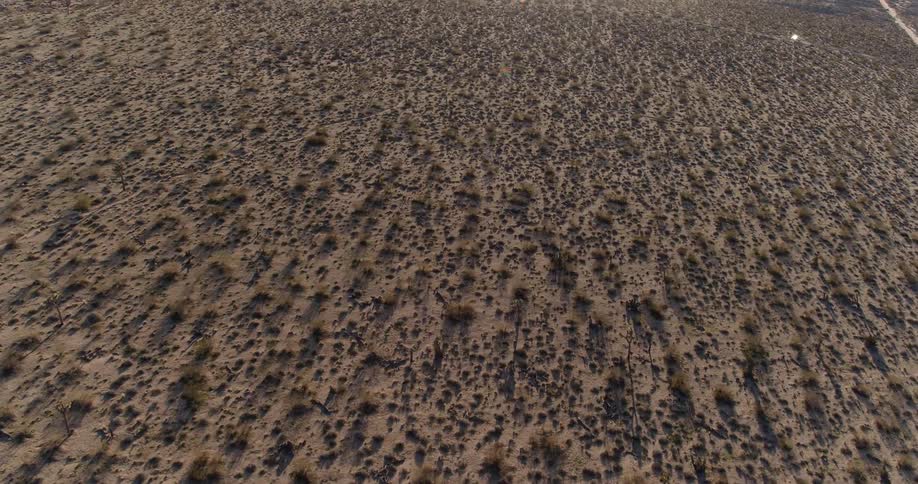 The desert has many hills and small trails