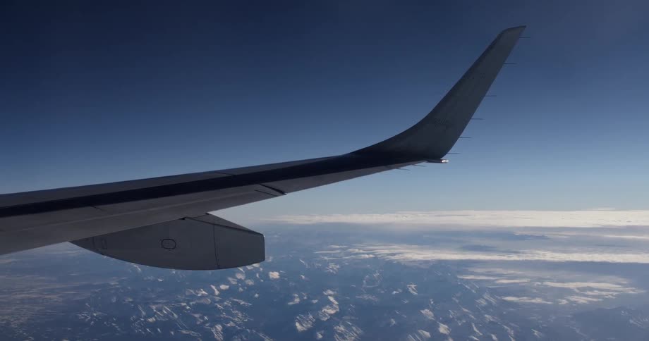 An airplane flies in the sky