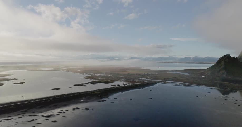 The water is calm near the shore