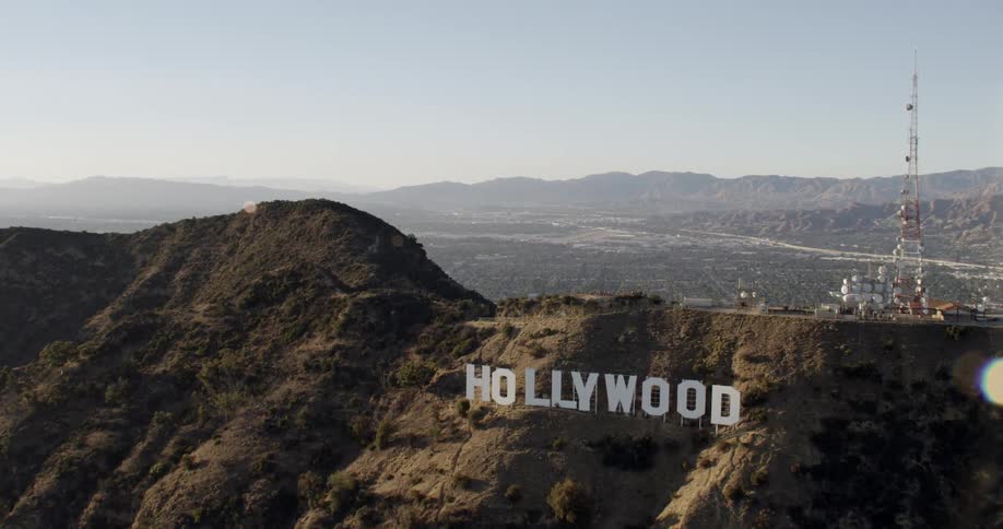 The hollywood sign is displayed on the side of a mountain