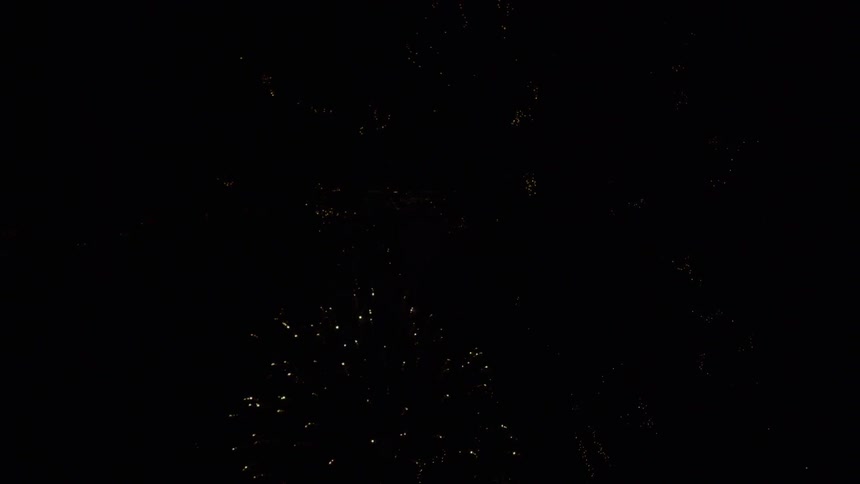 Fireworks shooting off in the night sky