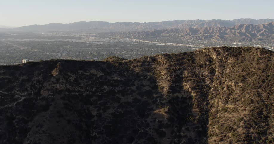 The mountains are tall and covered with green