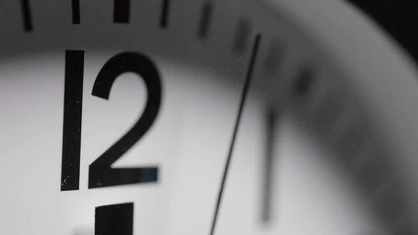 The second arm of the click slowly turns past twelve