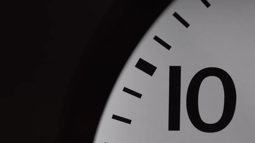 The click is showing ten as the second arm moves past