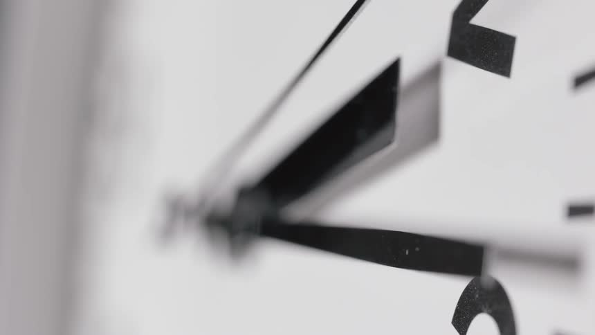 Seconds tick by on a clock