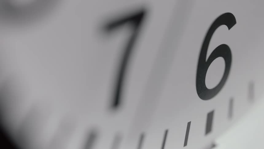 Seconds tick by on a clock