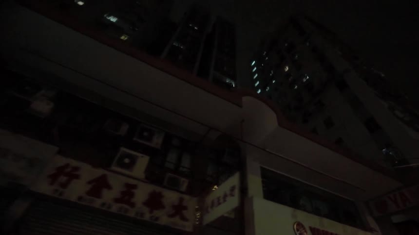 Rows of chinese businesses at night