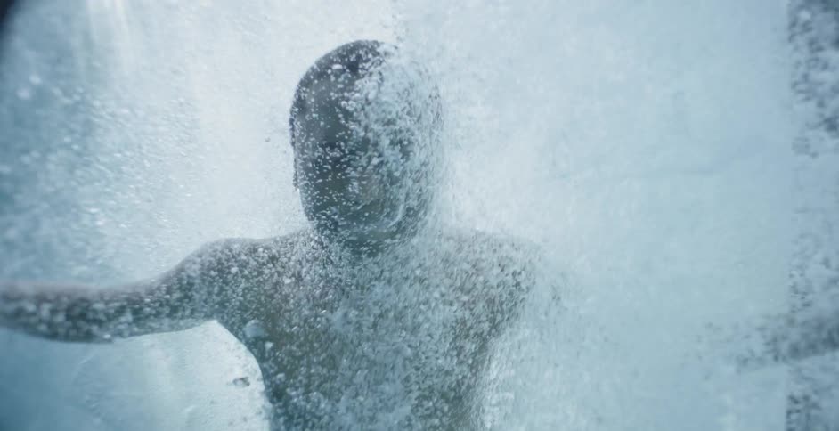 Child jumps into a pool and floats underwater