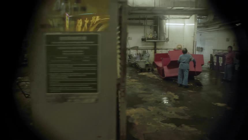 People are working indoors inside a warehouse in asia