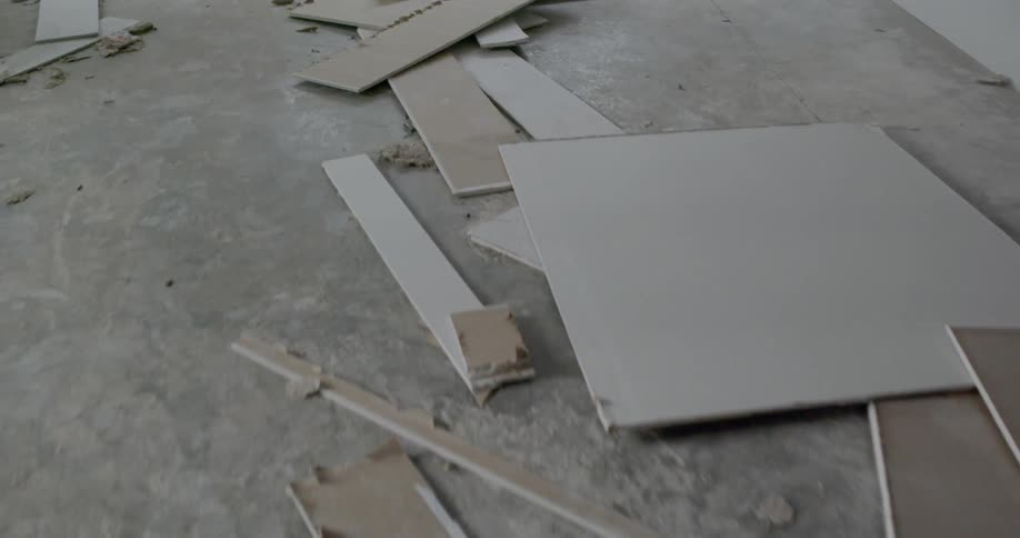 Sheetrock scraps cover the ground