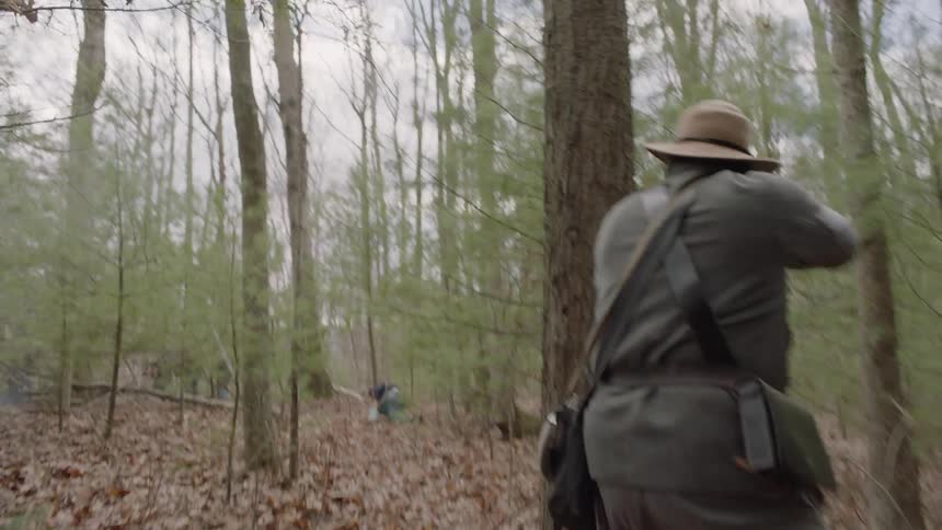 A soldier shoots and harms a rival soldier