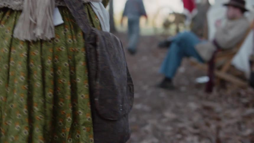 Woman's skirt as she walks through the woods