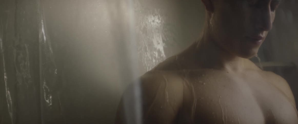 A man stands in the shower