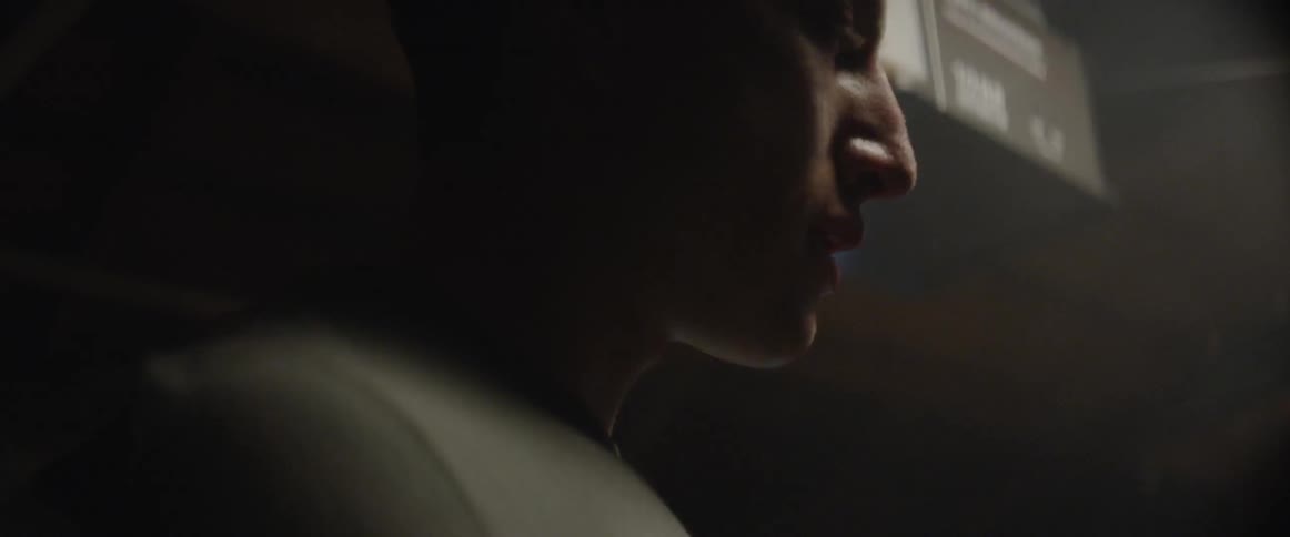A man's breath is visible as he exhales
