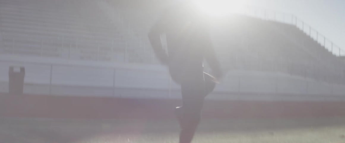 A man is running in place on the field