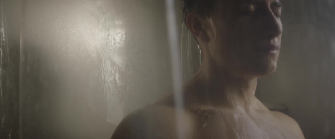 A man takes a shower