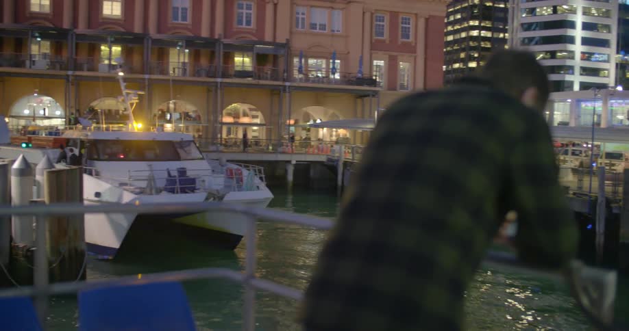 A man stares into the water