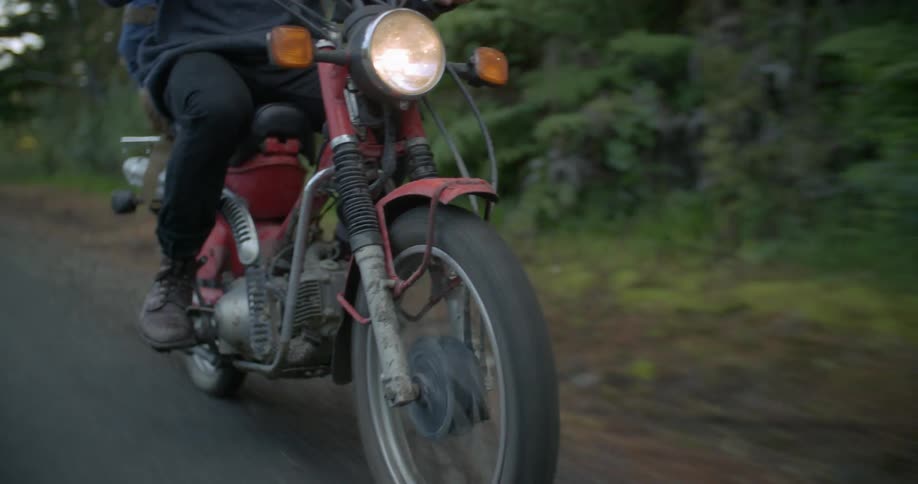 A man is riding his bike
