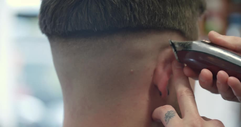 A barber gives a haircut