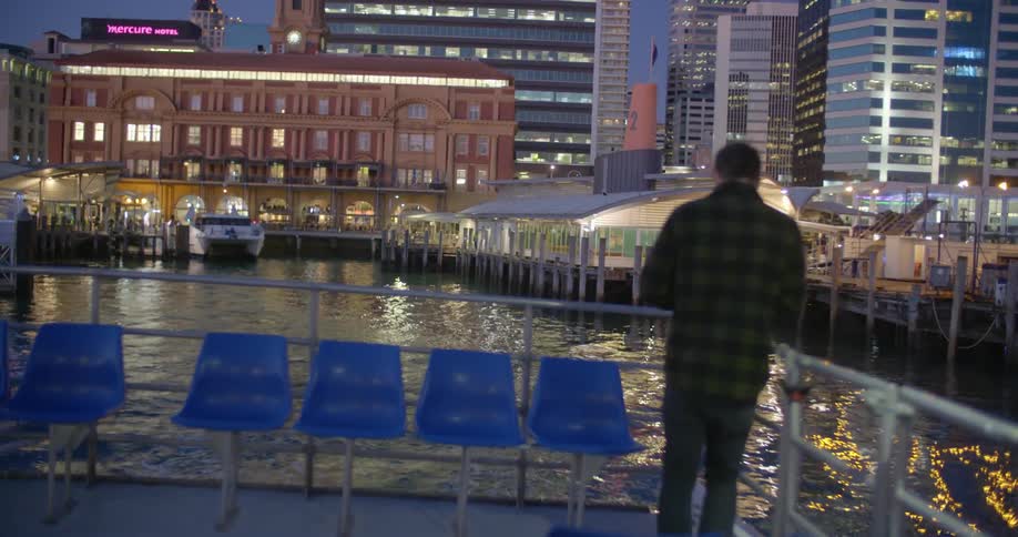 A man is riding a boat