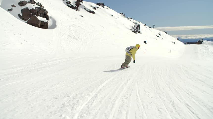 Man skiing down a very snow hill