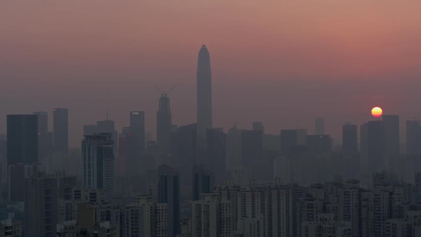 A city skyline at sunset