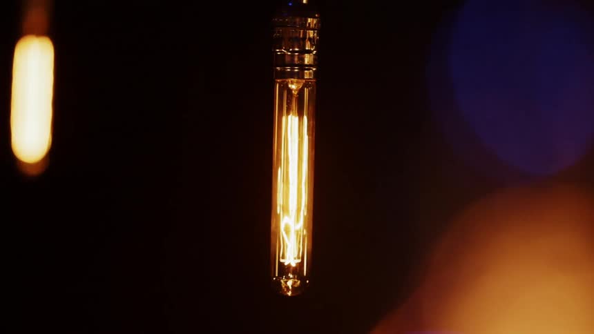 Light bulbs flicker while hanging from strings