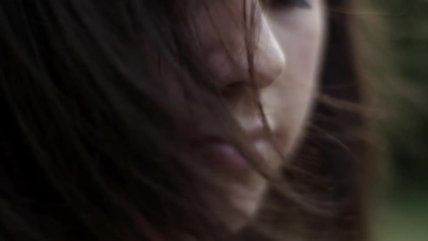 Wind blows through a woman's hair