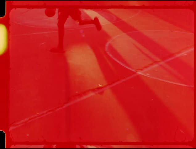 People play basketball on the court