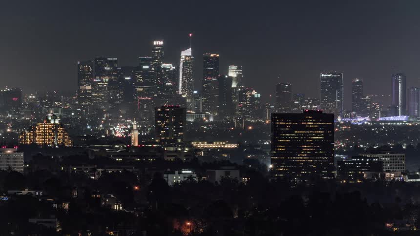 City lights illuminate the night sky