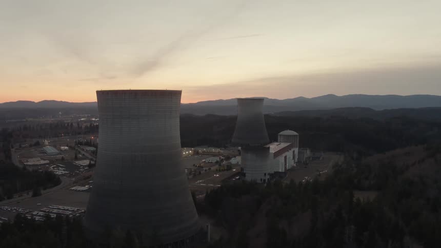 Orbiting around a nuclear power complex nestled in a mountain valley