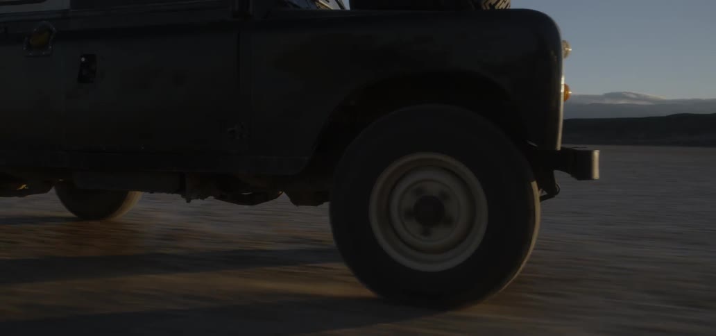 Vehicle drives on a rural field