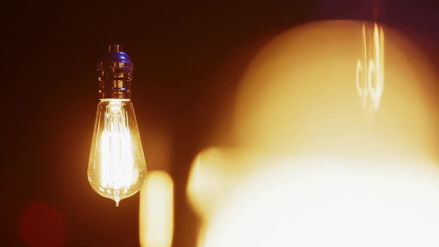 Swaying electric light bulbs