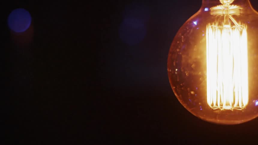 The large light bulb slowly turns on