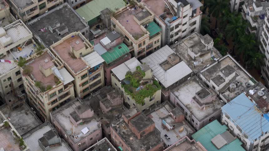 The row of apartment buildings are close together