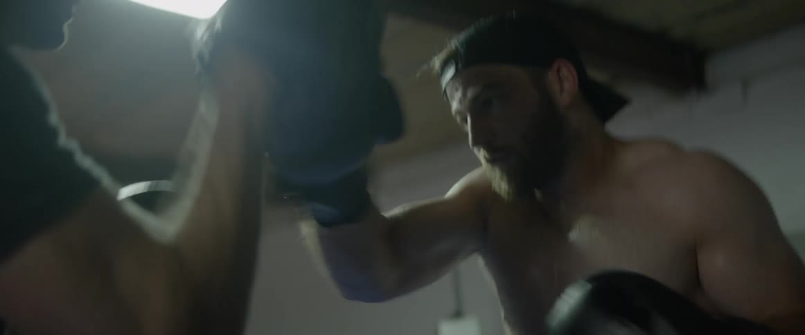 A man is practicing his boxing
