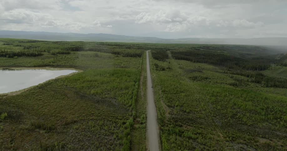 A road runs through a rural landscape