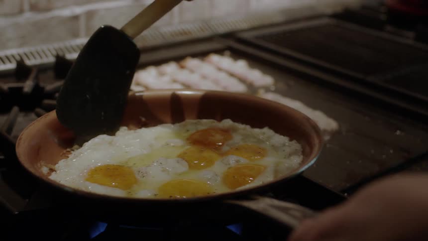 Eggs are cooked in a frying pan