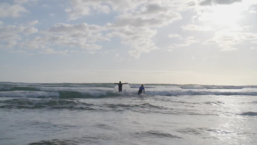 People are preparing to surf